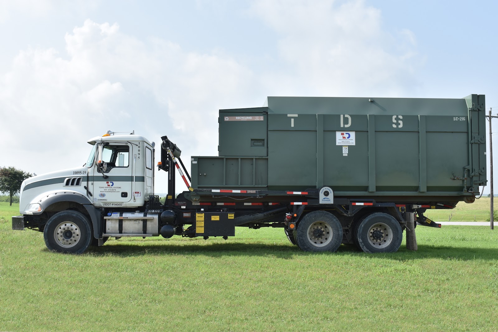 Texas Disposal Systems Compactor rental delivery