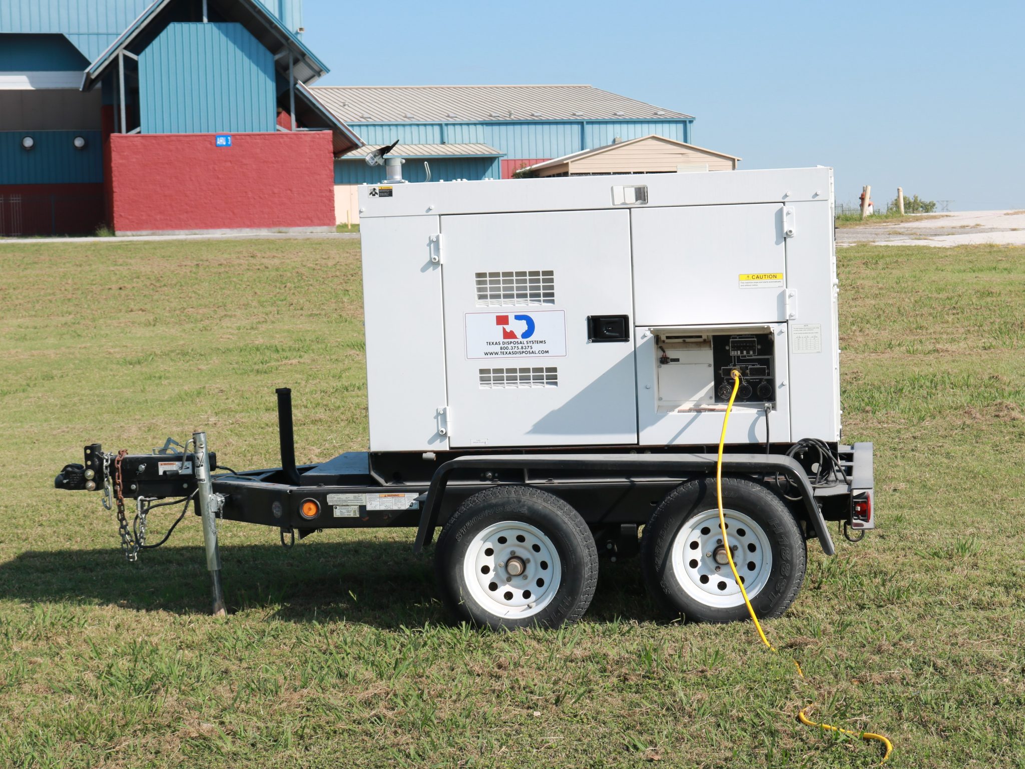 Generator on grassy field