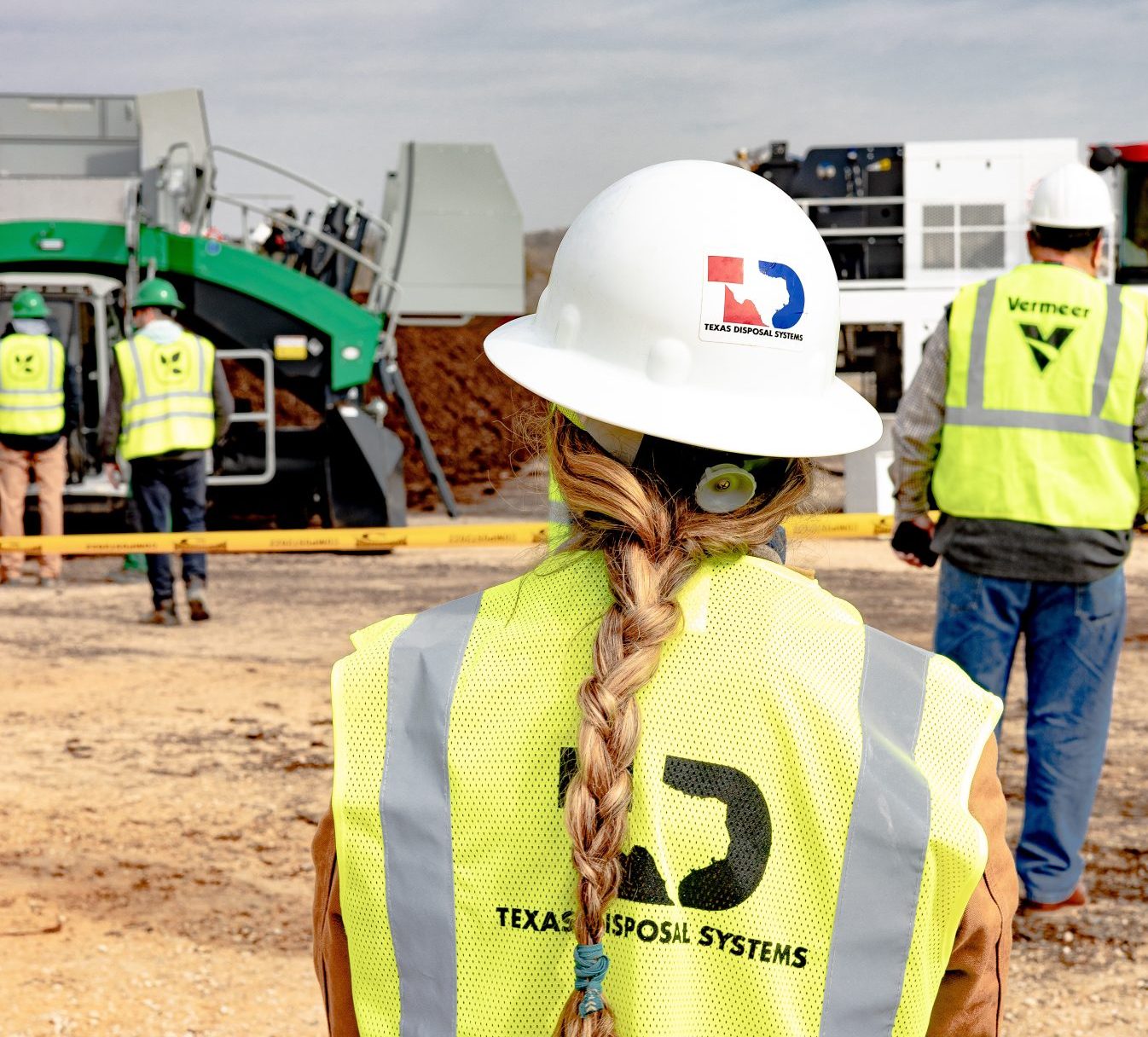 TDS team member with a hardhat on site