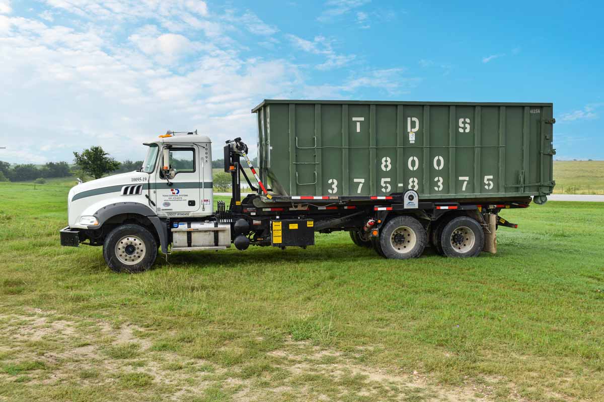 40 yard roll off dumpster on TDS truck