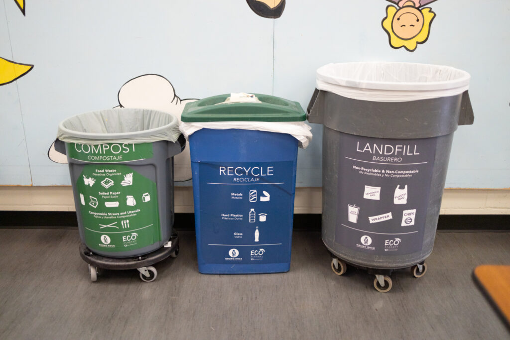 a compost, recycle, and trash bin