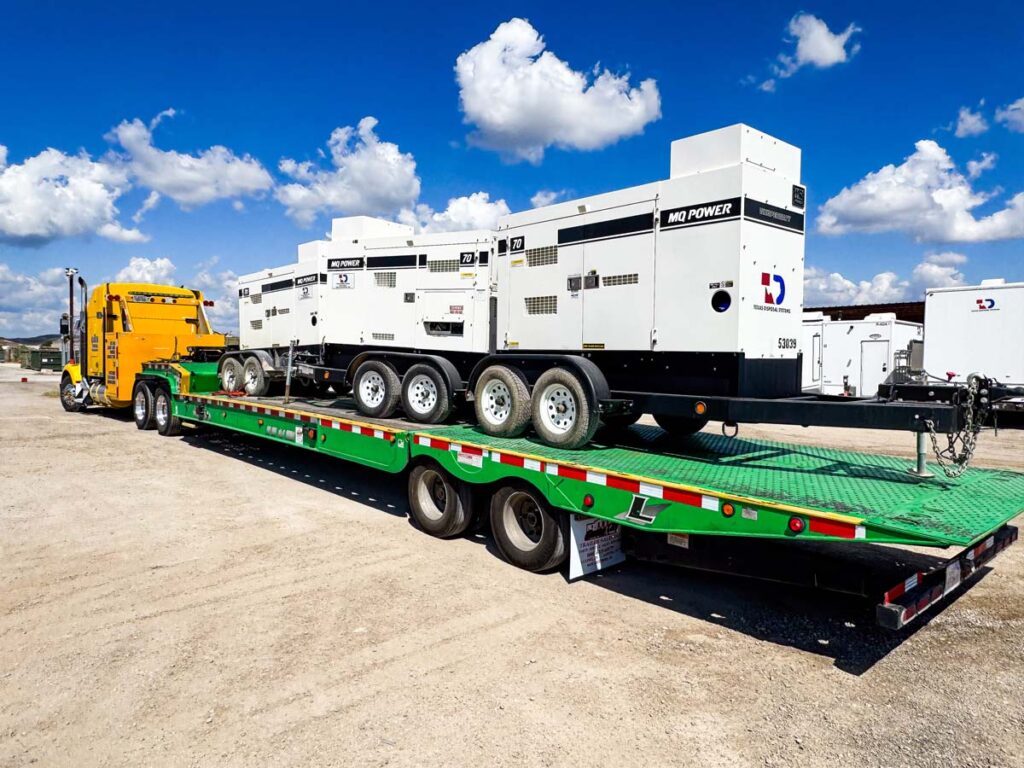 White TDS emergency generators on green truck