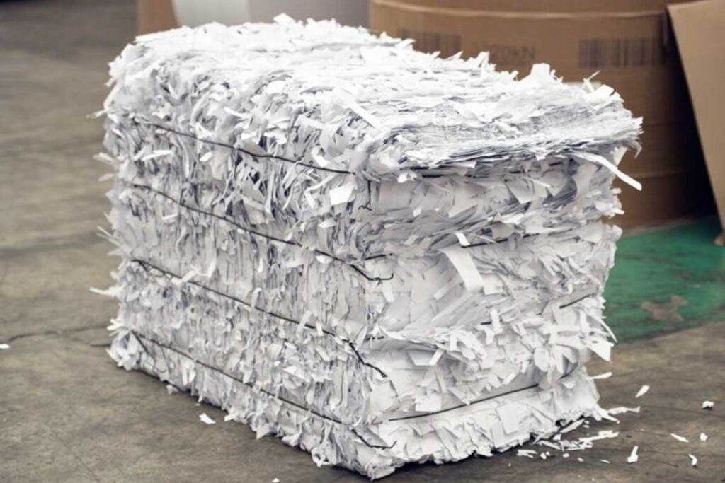Bundle of white shredded paper from recycled paper