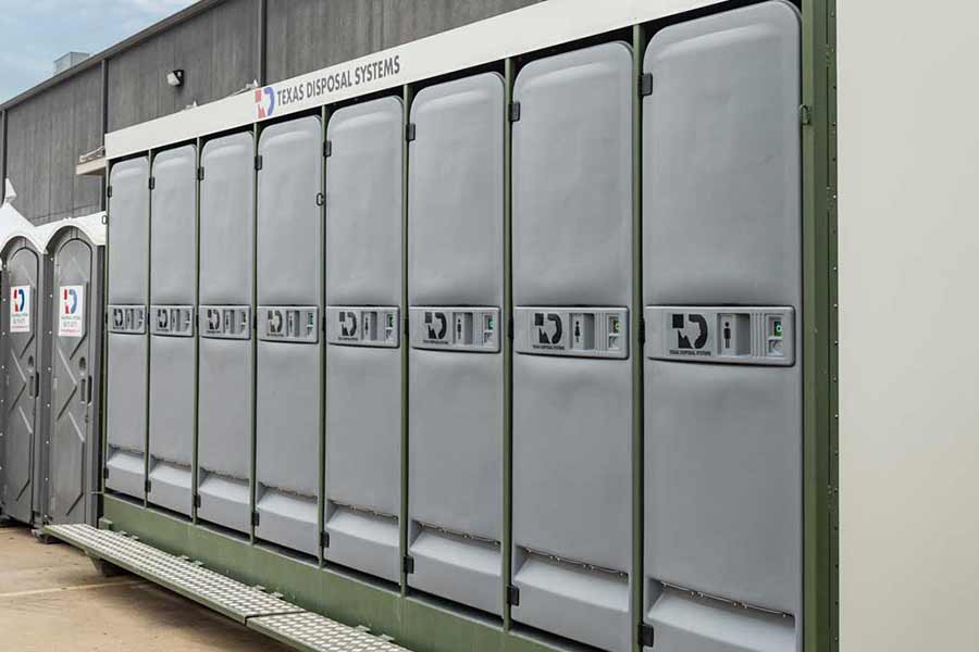 Grey TDS multi-stall units and portable restrooms