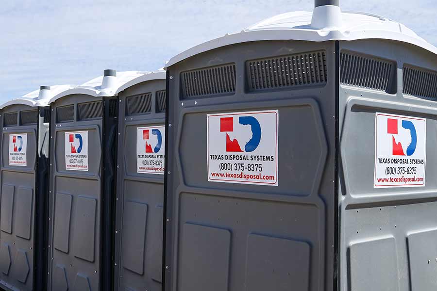 TDS portable restrooms or porta potties in a row
